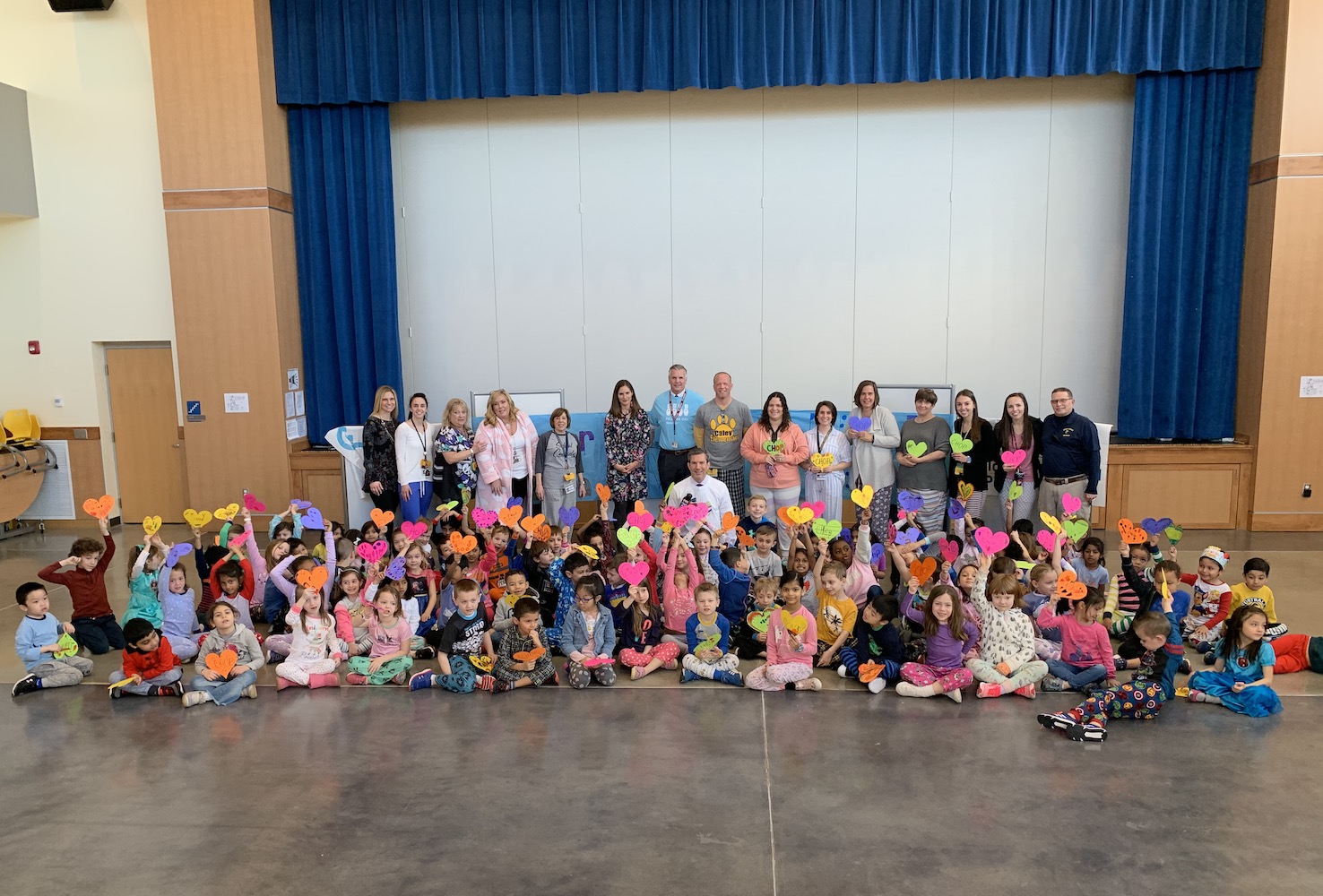 large group of children posing and dressed in pajamas