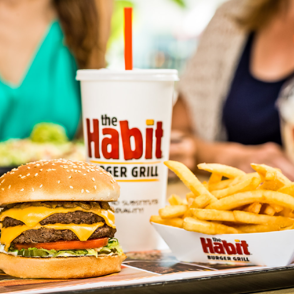 closeup of the Habit's burger and fries and drink