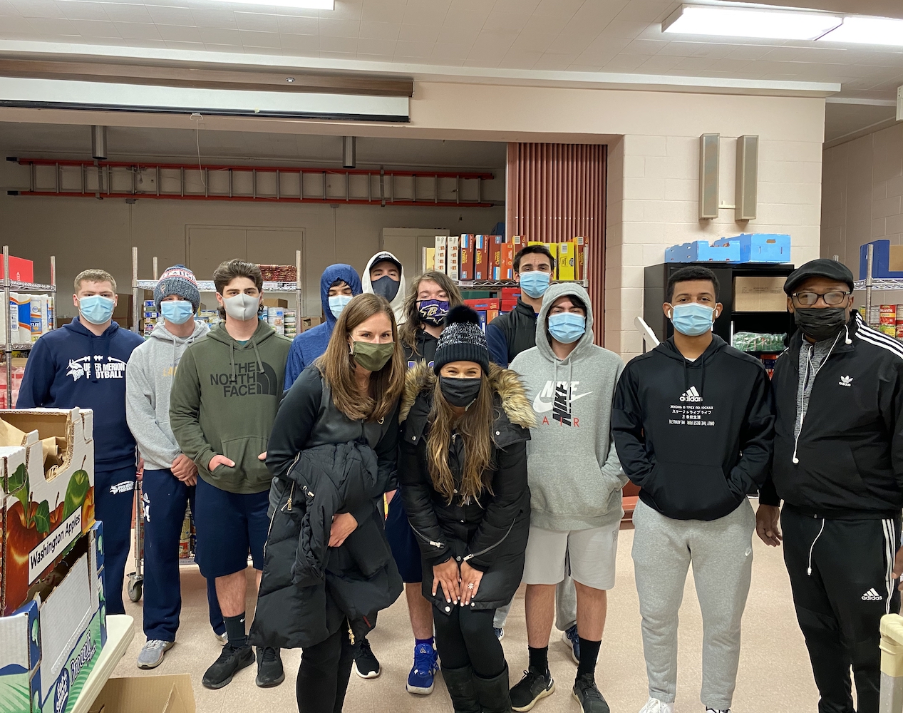 image of group of people wearing fast masks posing indoors