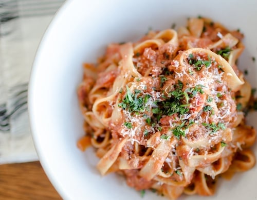 noodle and sauce dish with grated cheese