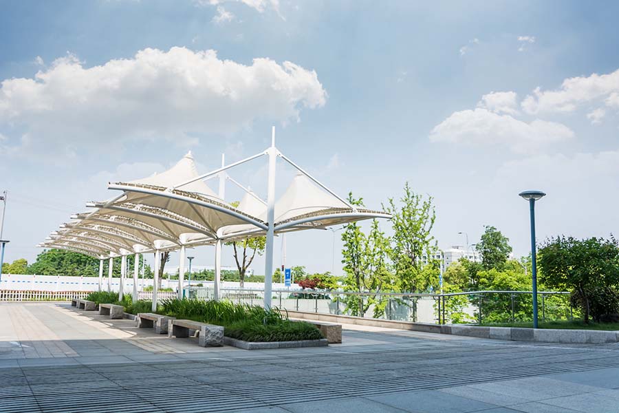 constructed shade canopies over outdoor seating area