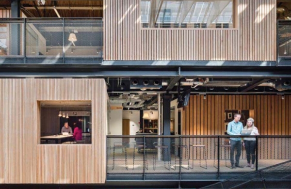 coworking space with wooden cubicles