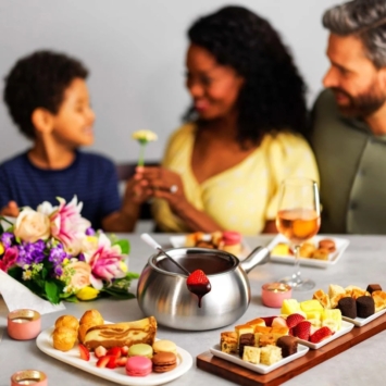 fondue pot with three people in the background