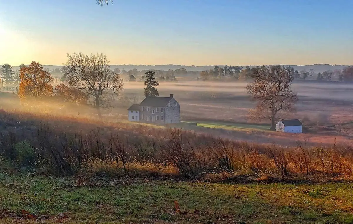 stone house in a field