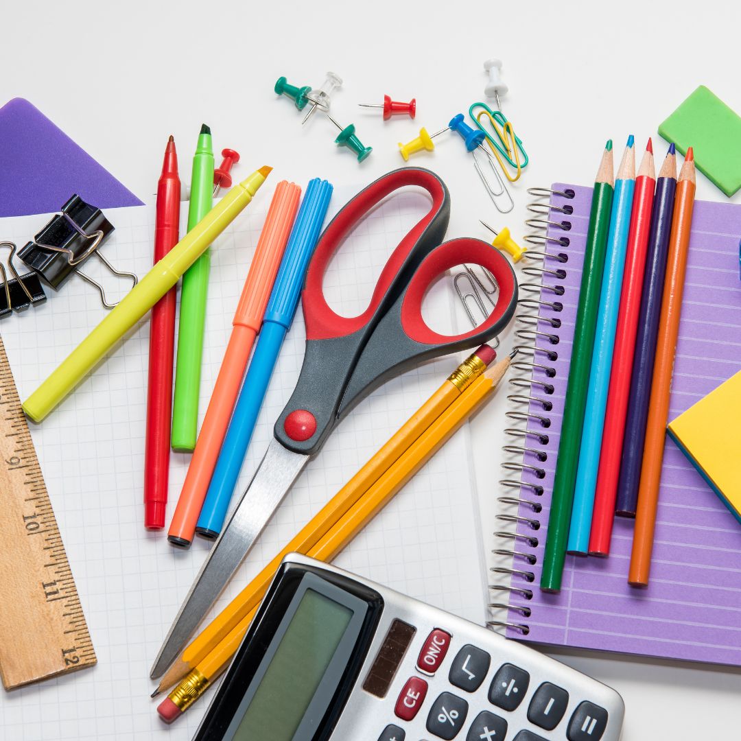pens, scissors and a calculator