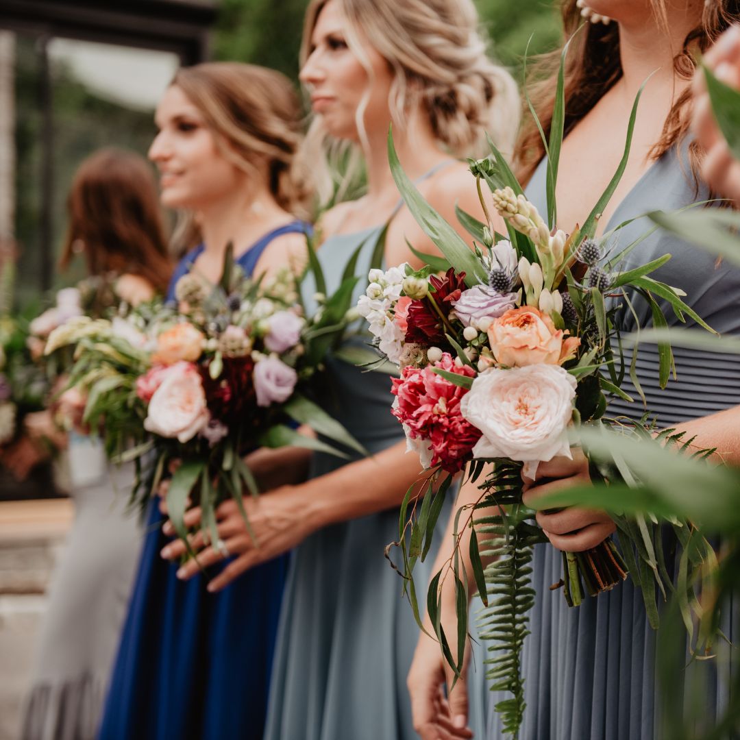 bridesmaids holding floral bouquets