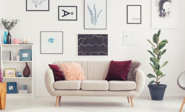 couch surrounded by wall art