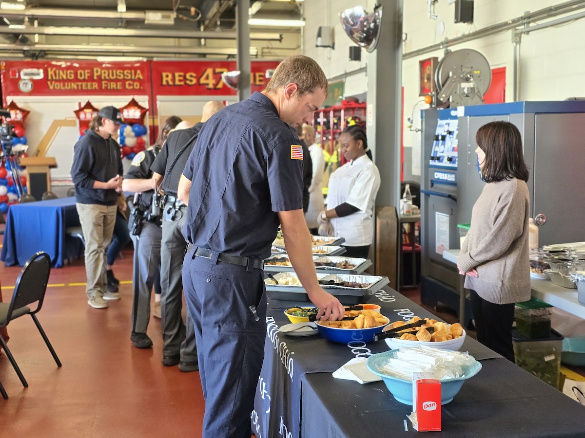 EMT getting a plate of food