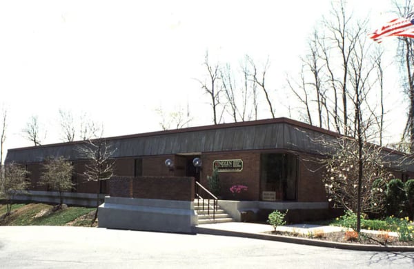 exterior of single story brick building