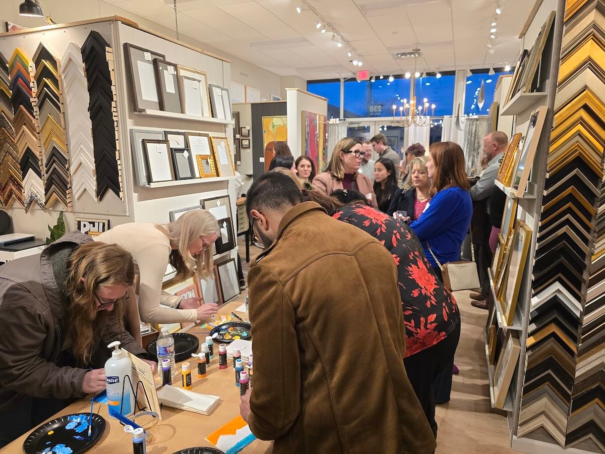 group of people in a an art gallery
