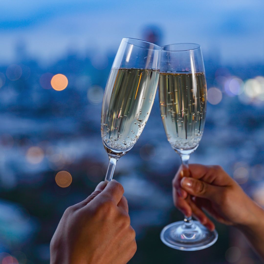 champagne glasses cheersing