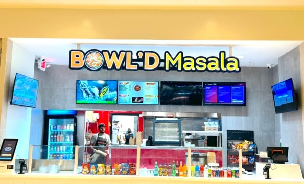 exterior of bowl'd masala storefront