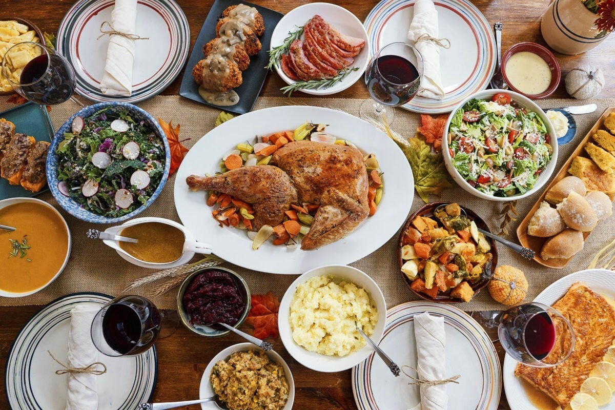 table full of thanksgiving themed food